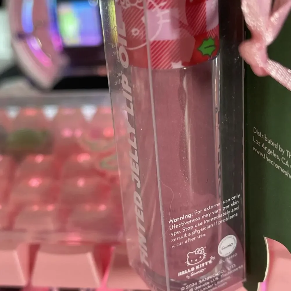 The Creme Shop Hello Kitty Christmas Lip Oil Tinted Jelly Crystal Rose Sanrio